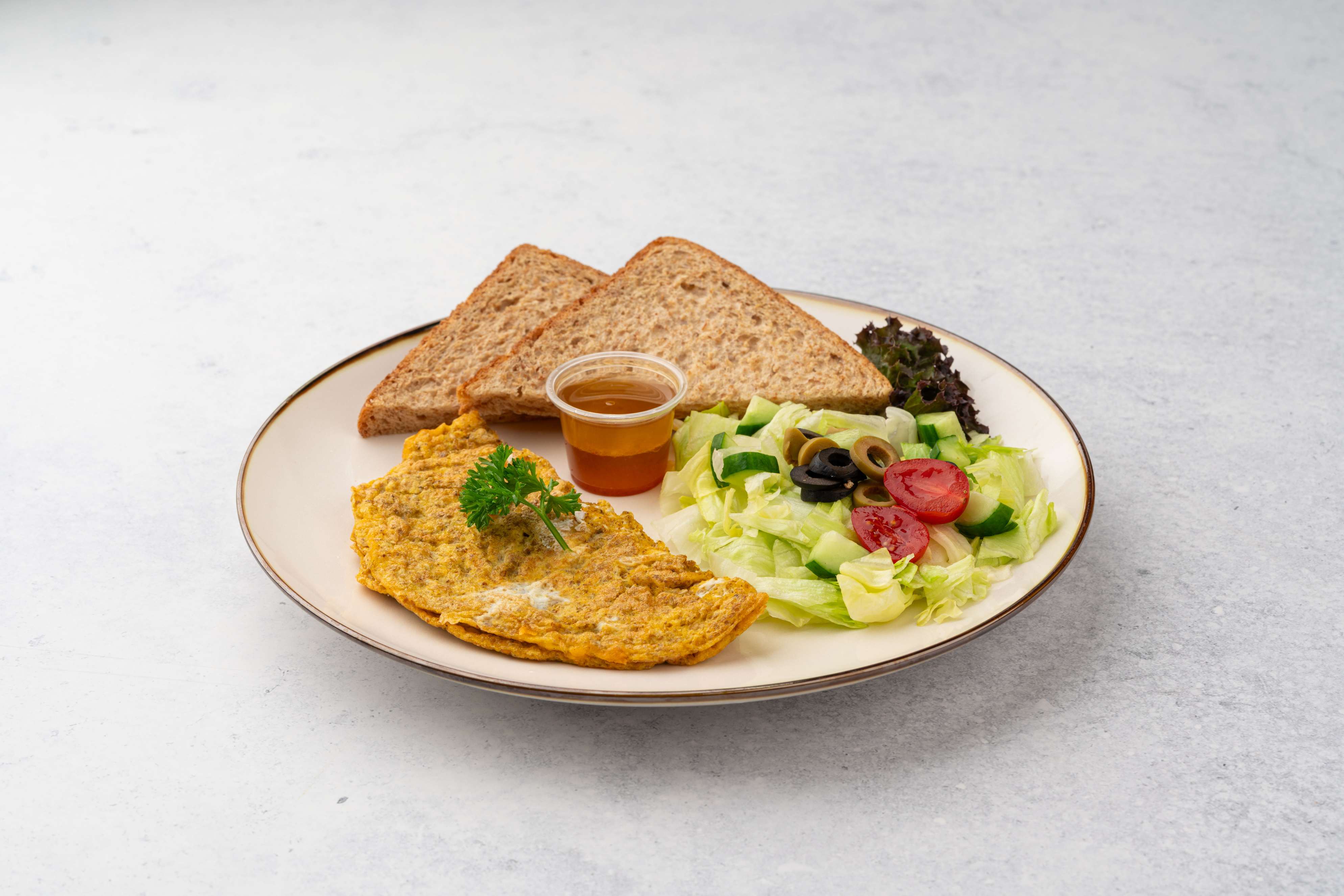 Zaater Egg With Mozzarella Cheese Brown Toast And Green Salad